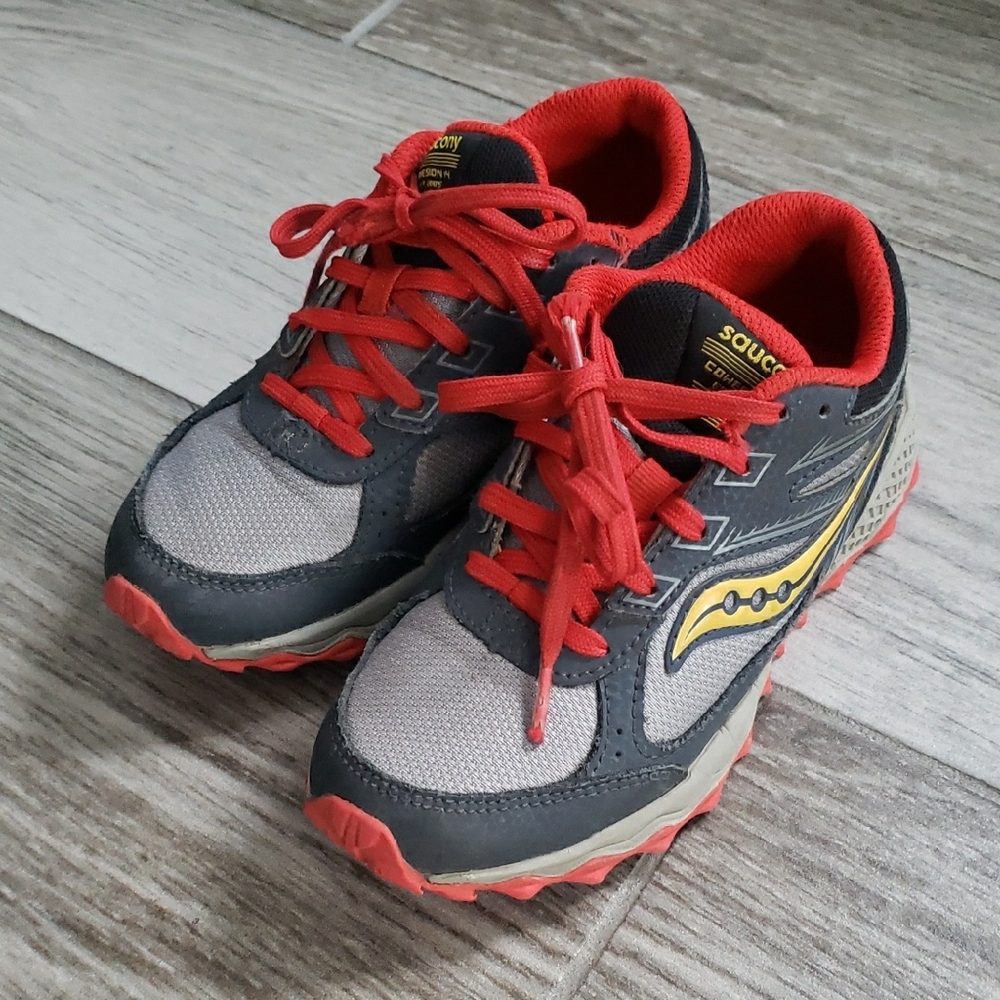 Saucony Gray and Red Sneakers with Distinctive Design